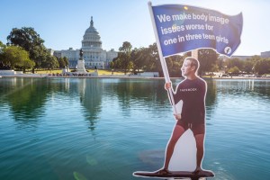 A seven-foot visual protest outside the US Capitol depicting Facebook CEO Mark Zuckerberg surfing on a wave of cash Thursday, Sept. 30, 2021, in Washington, DC.