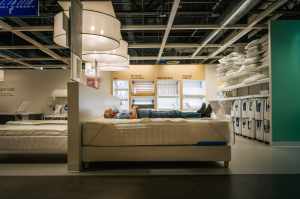 A person rests in an IKEA store. Photo: Brandon Bell/Getty Images​