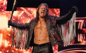 Chris Jericho holding a bat on AEW television